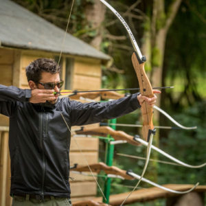 Archery at CDP Man practicing bow and arrow