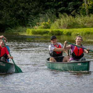 Canoeing Lake Two canoes with people rowing