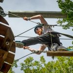 Man on high ropes octagon course 4