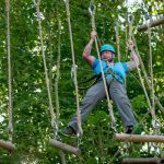 Man on high ropes octagon course 3