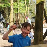 child with ice cream in elf village 2